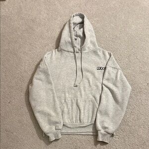 Subdued grey hoodie with blue star